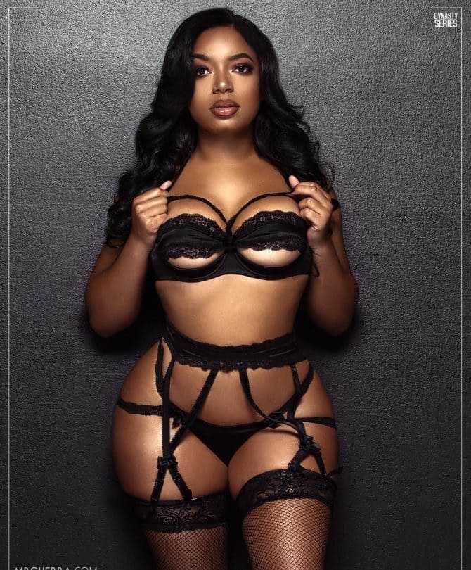 Sexy black woman with big tits and hips.