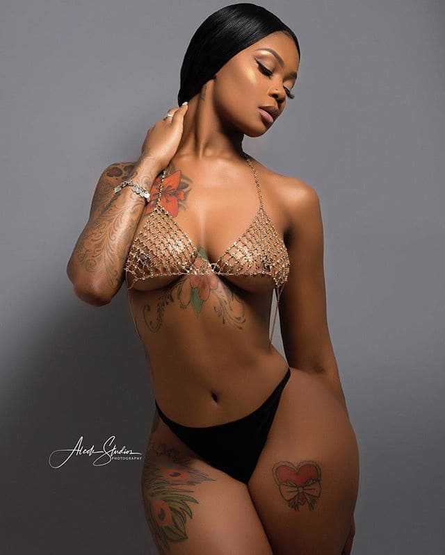 Black girl in a bikini with a beautiful figure