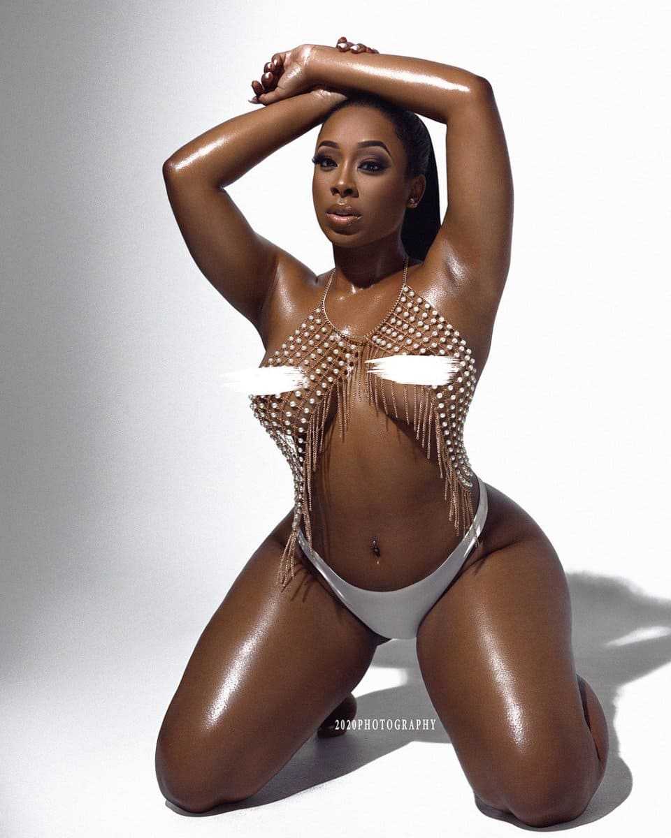 Sexy black woman with a hot figure, big ass, big boobs