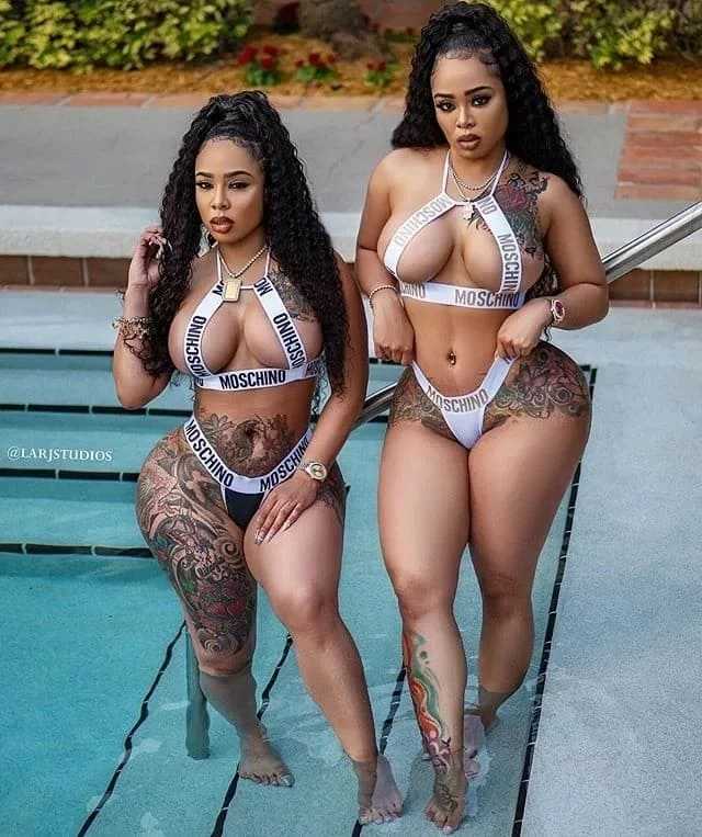 Two hot sexy black girls with big butt, big boobs